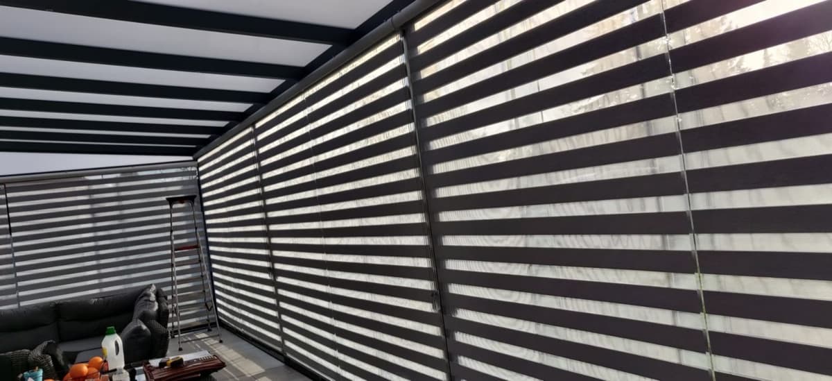 Duo rolgordijnen in een veranda - Sin-tex gordijnen en raamdecoratie, Heusden-Zolder